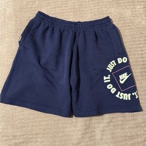 Nike Men's Navy Athletic Shorts with 'Just Do It' Graphic